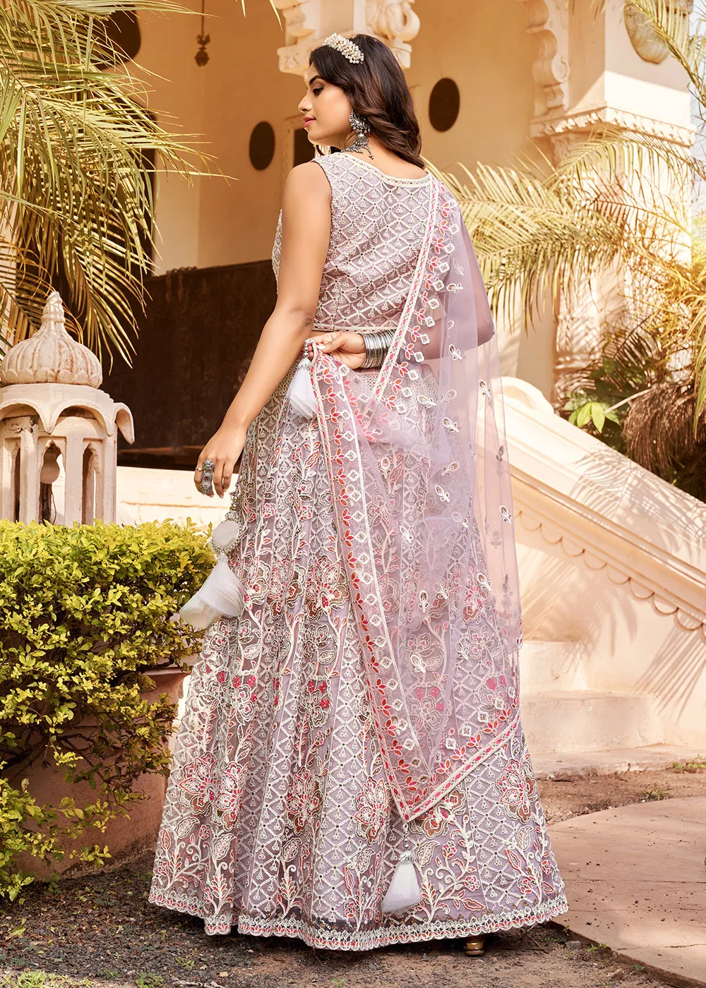 Exuberant Mauve Premium Net Designer Wedding Lehenga Choli