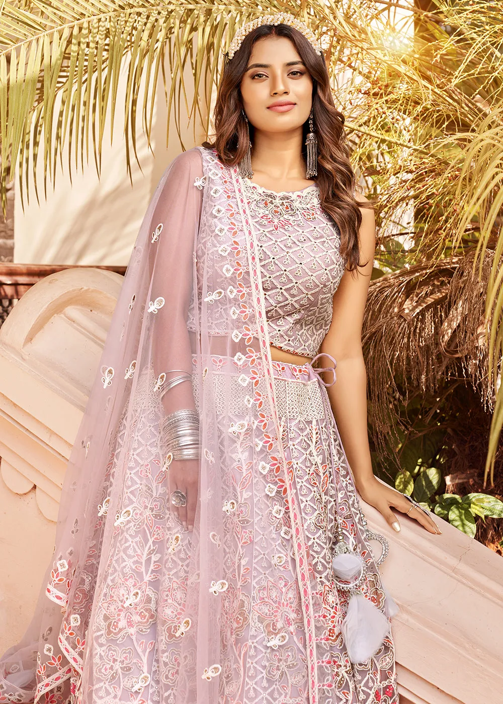 Exuberant Mauve Premium Net Designer Wedding Lehenga Choli